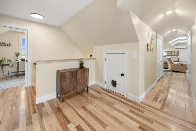 40 Briggs Rd, Lebanon, CT 06249 - bonus room featuring lofted ceiling, baseboard heating, and light wood-style flooring