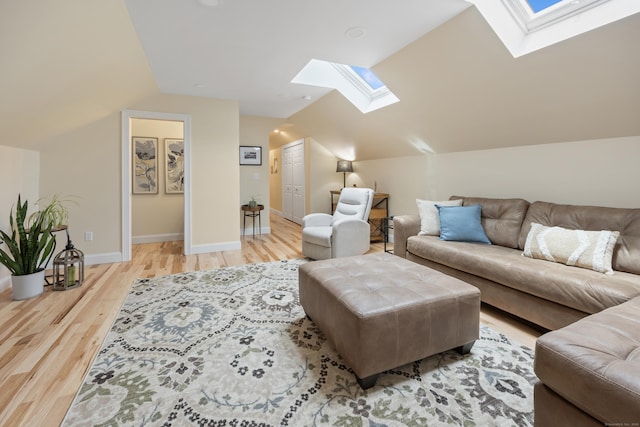 40 Briggs Rd, Lebanon, CT 06249 - living room featuring a skylight, vaulted ceiling, and wood finished floors