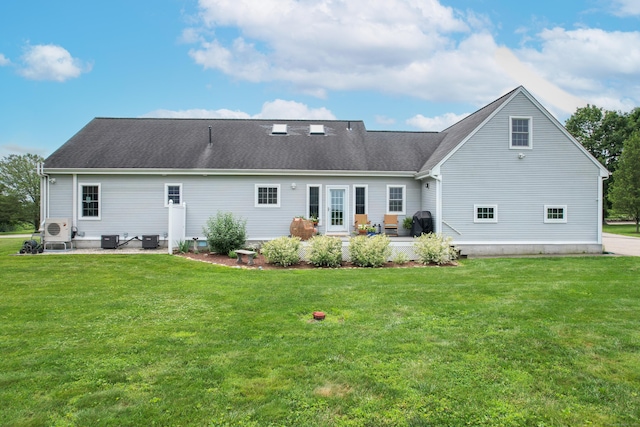 40 Briggs Rd, Lebanon, CT 06249 - rear view of property featuring a patio area, a yard, and roof with shingles