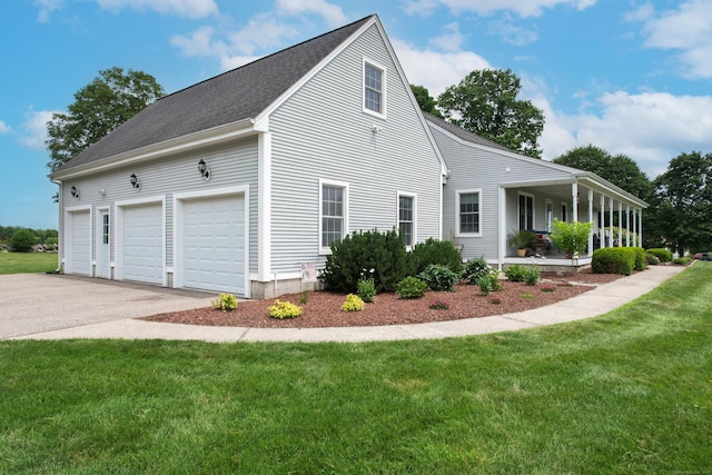 40 Briggs Rd, Lebanon, CT 06249 - view of side of home with asphalt driveway, a lawn, and a shingled roof