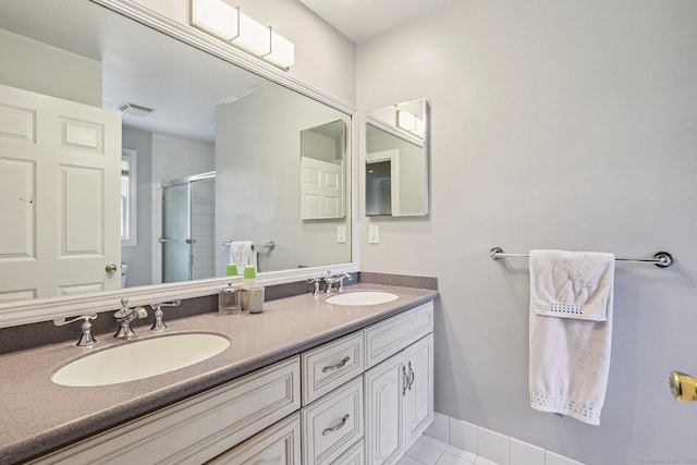 25 Encampment Pl, Ridgefield, CT 06877 - bathroom with a stall shower, double vanity, and tile patterned flooring