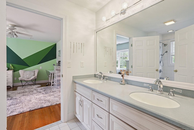 25 Encampment Pl, Ridgefield, CT 06877 - full bath with ensuite bath, double vanity, a shower, a ceiling fan, and wood finished floors