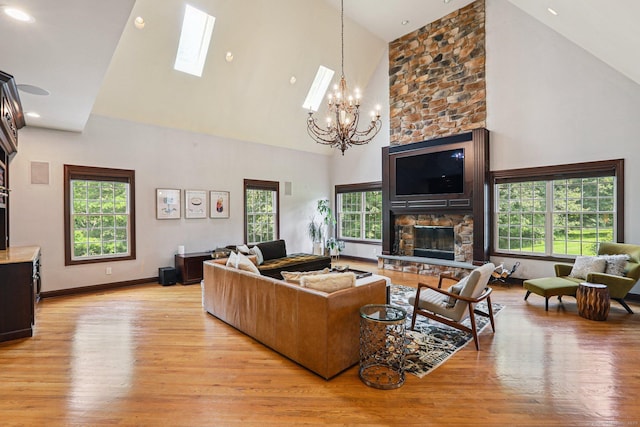 25 Encampment Pl, Ridgefield, CT 06877 - living area featuring high vaulted ceiling, light wood-style floors, healthy amount of natural light, and recessed lighting