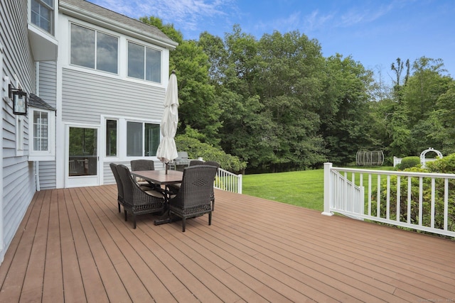 25 Encampment Pl, Ridgefield, CT 06877 - wooden deck with a yard, outdoor dining space, and view of scattered trees