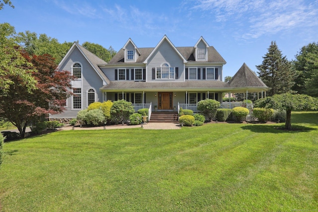 25 Encampment Pl, Ridgefield, CT 06877 - colonial inspired home featuring a front lawn and a porch