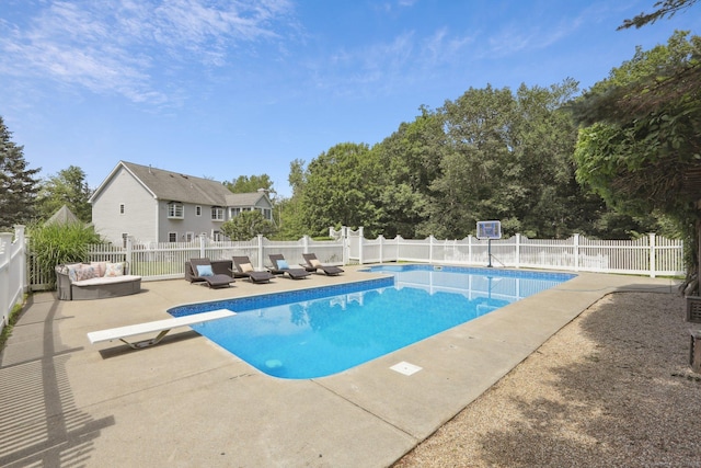 25 Encampment Pl, Ridgefield, CT 06877 - view of swimming pool featuring a diving board, a patio area, and a fenced backyard