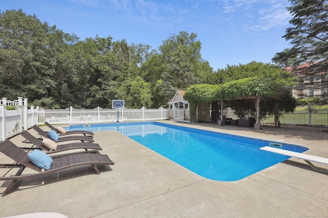 25 Encampment Pl, Ridgefield, CT 06877 - view of swimming pool with a diving board, a patio area, an outdoor hangout area, and a gazebo