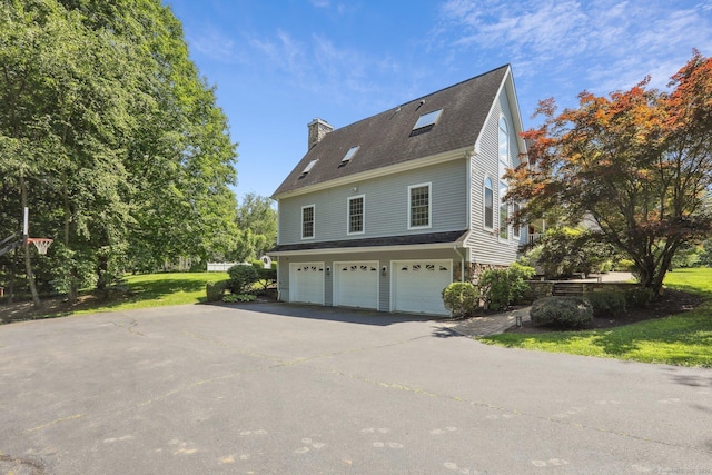 25 Encampment Pl, Ridgefield, CT 06877 - view of property exterior with an attached garage, a chimney, asphalt driveway, a lawn, and roof with shingles