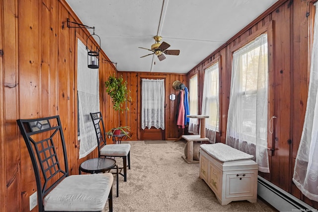 53 Cleveland St, Putnam, CT 06260 - sitting room with a ceiling fan, baseboard heating, light colored carpet, and wood walls