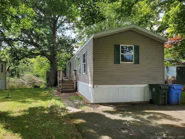 252 Old Canterbury Tpke Lot 19, Norwich, CT 06360 - view of home's exterior featuring a lawn