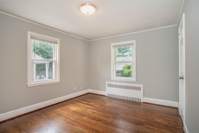 30 Jackson Ave, West Hartford, CT 06110 - spare room featuring radiator, ornamental molding, and wood finished floors
