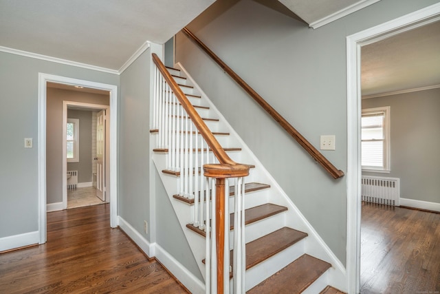 30 Jackson Ave, West Hartford, CT 06110 - stairway featuring radiator, crown molding, and wood finished floors