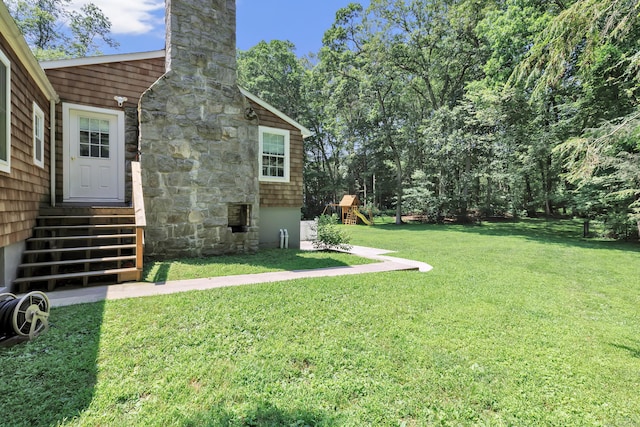39 Clover Dr, Wilton, CT 06897 - view of green lawn featuring a playground