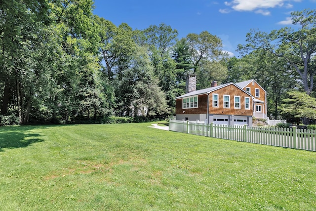 39 Clover Dr, Wilton, CT 06897 - view of yard featuring an attached garage