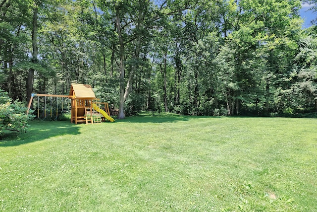 39 Clover Dr, Wilton, CT 06897 - view of grassy yard with a playground