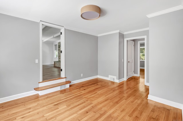 39 Clover Dr, Wilton, CT 06897 - empty room with light wood-style flooring and ornamental molding