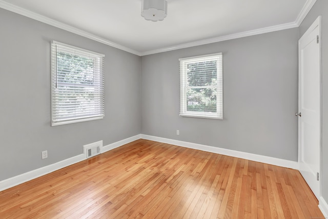 39 Clover Dr, Wilton, CT 06897 - spare room with light wood-style flooring and crown molding