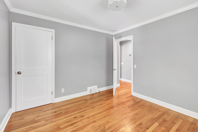 39 Clover Dr, Wilton, CT 06897 - spare room with light wood-style flooring and ornamental molding