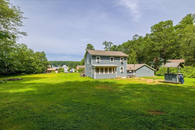 70 Laurel Hill Dr, Woodstock, CT 06282 - rear view of property with a yard and a sunroom
