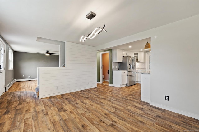 70 Laurel Hill Dr, Woodstock, CT 06282 - unfurnished living room with wood finished floors, a ceiling fan, and recessed lighting
