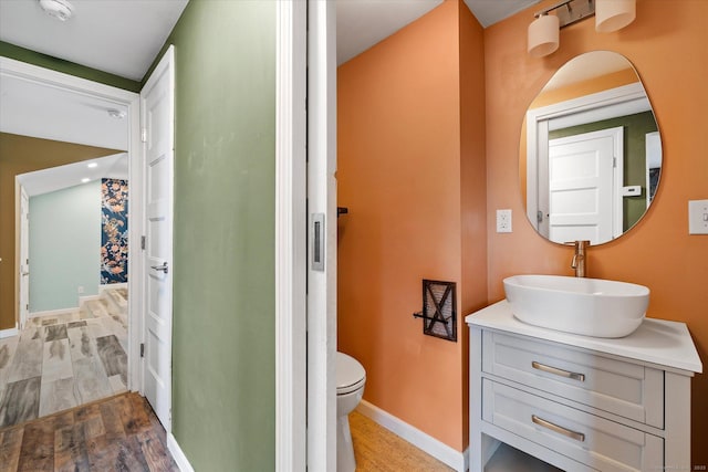 70 Laurel Hill Dr, Woodstock, CT 06282 - bathroom with vanity and wood finished floors