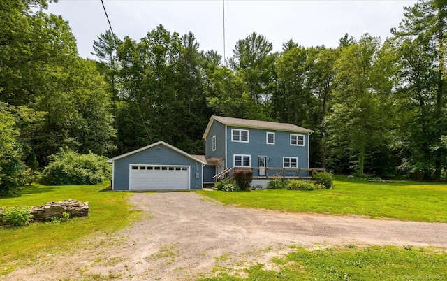 70 Laurel Hill Dr, Woodstock, CT 06282 - colonial-style house featuring a detached garage, a front lawn, and a wooden deck