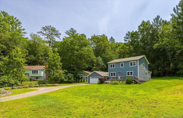 70 Laurel Hill Dr, Woodstock, CT 06282 - view of front facade with dirt driveway, a front lawn, and a forest view