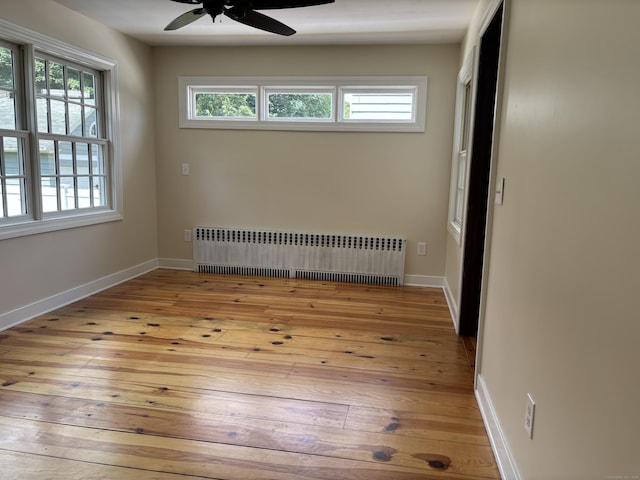 60 Ardmore St, Hamden, CT 06517 - unfurnished room with radiator, a ceiling fan, and wood-type flooring