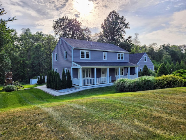 3 Old Woods Rd, Brookfield, CT 06804 - view of front of property with a porch, a front lawn, and a shingled roof