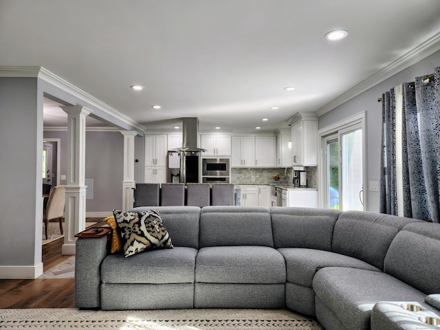 3 Old Woods Rd, Brookfield, CT 06804 - living room featuring ornate columns, wood finished floors, ornamental molding, and recessed lighting