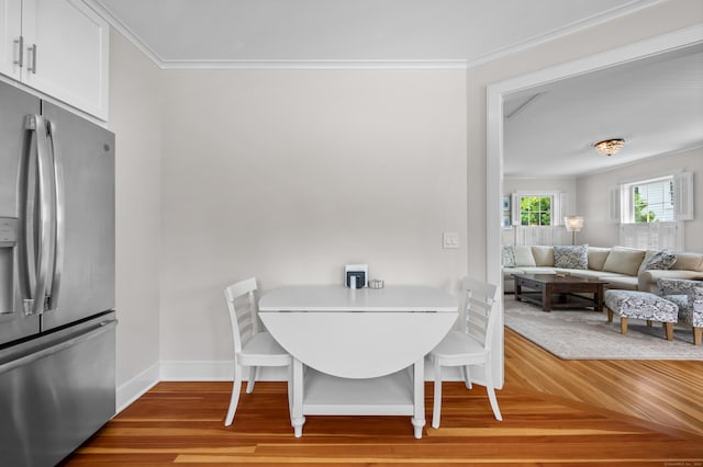 5 S Main St, Essex, CT 06426 - dining space featuring light wood finished floors and ornamental molding