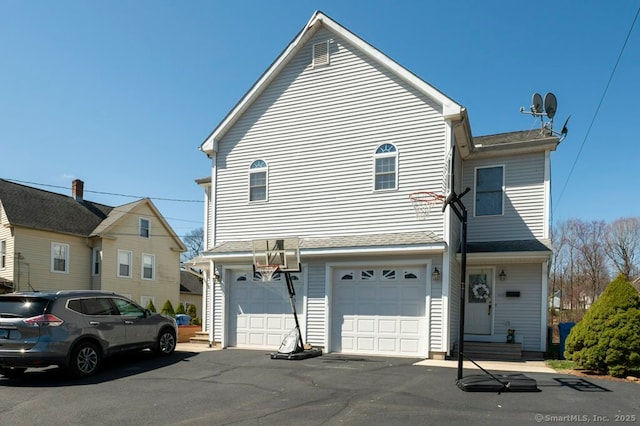 82 Summer St Unit A, Southington, CT 06489 - traditional home featuring a garage and driveway