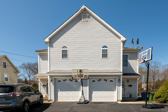 82 Summer St Unit A, Southington, CT 06489 - view of side of property with an attached garage and driveway