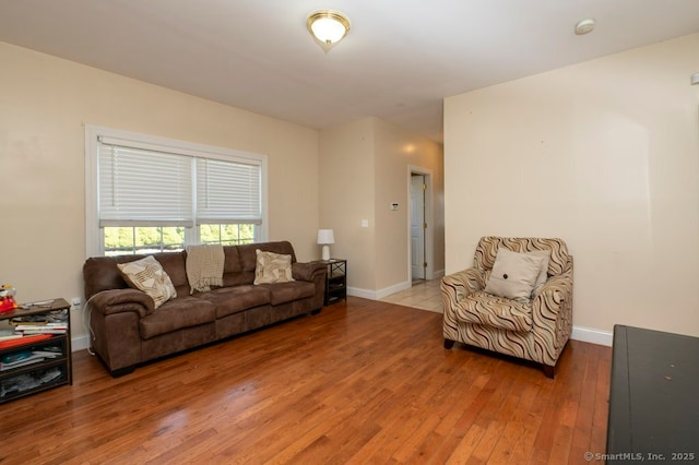 82 Summer St Unit A, Southington, CT 06489 - living room featuring light wood-style floors and baseboards