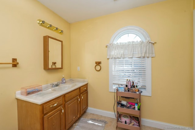 82 Summer St Unit A, Southington, CT 06489 - bathroom with vanity and tile patterned floors