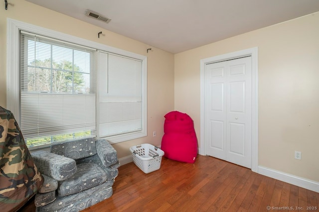 82 Summer St Unit A, Southington, CT 06489 - living area with wood finished floors and baseboards
