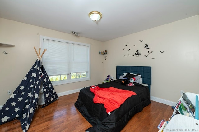 82 Summer St Unit B, Southington, CT 06489 - bedroom with baseboards and wood-type flooring