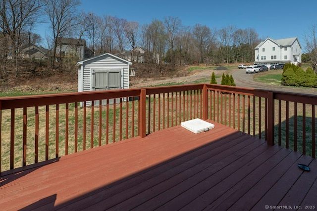 82 Summer St Unit B, Southington, CT 06489 - wooden deck featuring a storage unit and a lawn