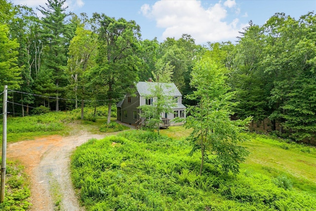 853 Pole Bridge Rd, Woodstock, CT 06281 - view of front of house with dirt driveway and a wooded view