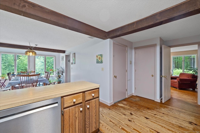 853 Pole Bridge Rd, Woodstock, CT 06281 - kitchen featuring dishwasher, light wood finished floors, beamed ceiling, a textured ceiling, and pendant lighting