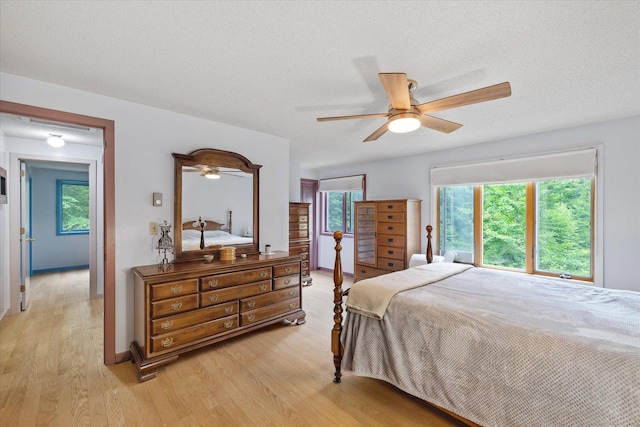 853 Pole Bridge Rd, Woodstock, CT 06281 - bedroom with light wood-style floors and ceiling fan