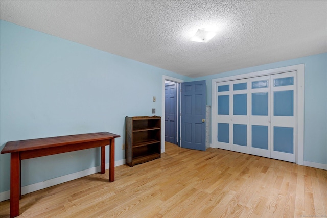 853 Pole Bridge Rd, Woodstock, CT 06281 - spare room with wood finished floors and a textured ceiling