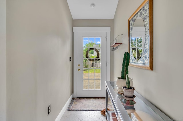 12 Scott St, West Haven, CT 06516 - doorway with baseboards and tile patterned floors