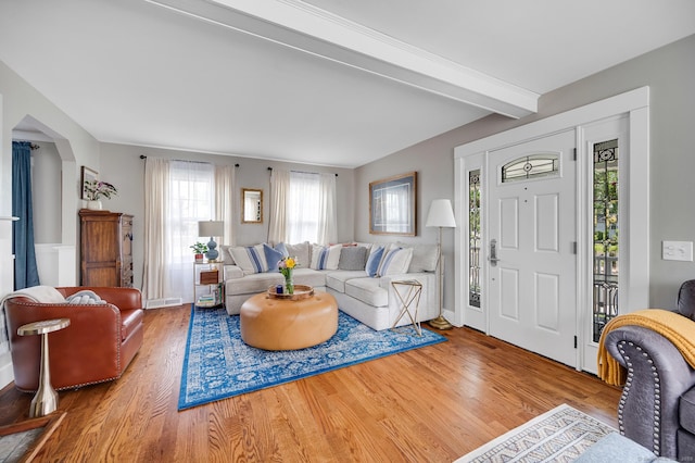 12 Scott St, West Haven, CT 06516 - living room with wood finished floors and beamed ceiling