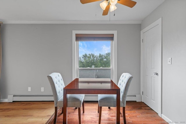 153 Marconi Ave Unit 153, Bridgeport, CT 06606 - dining room with a baseboard heating unit, light wood-type flooring, ceiling fan, and ornamental molding