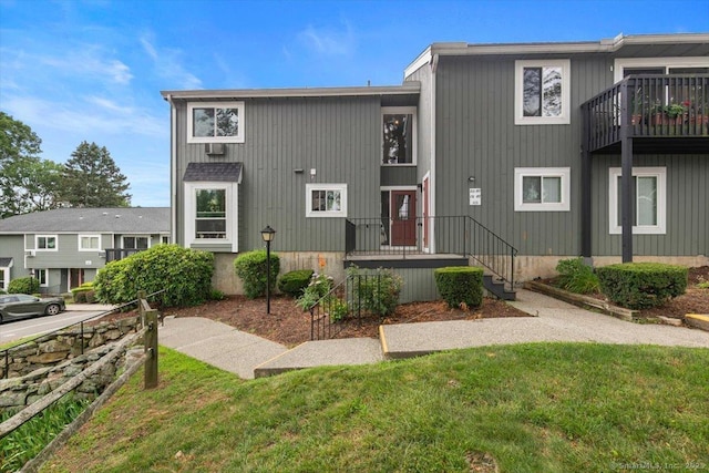 153 Marconi Ave Unit 153, Bridgeport, CT 06606 - view of property with a front yard and a balcony