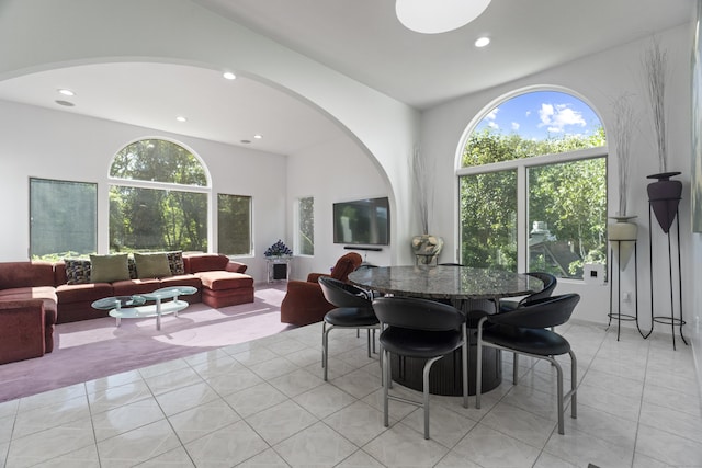 45 Brookview Ct, Groton, CT 06340 - dining area with arched walkways, healthy amount of natural light, recessed lighting, and light tile patterned floors