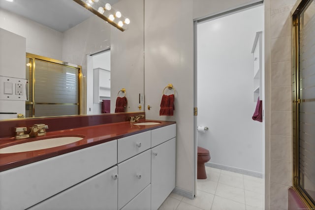 45 Brookview Ct, Groton, CT 06340 - bathroom with double vanity, a shower with shower door, and tile patterned flooring
