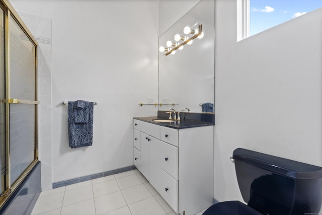 45 Brookview Ct, Groton, CT 06340 - bathroom featuring vanity, bath / shower combo with glass door, and tile patterned flooring