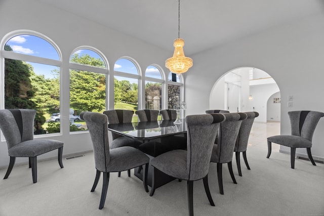 45 Brookview Ct, Groton, CT 06340 - dining room with arched walkways and light colored carpet